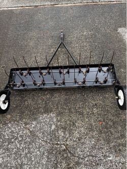 40” brinly tow behind thatcher