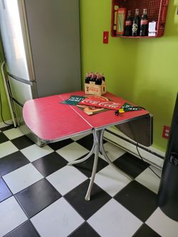 50' crome drop leaf table
