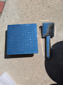 Like-new square 7.5-inch Shower Head with handle. Chrome.