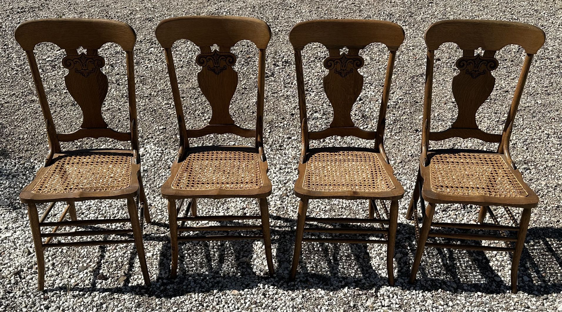 4 Matching Oak Carved Canned Chairs 