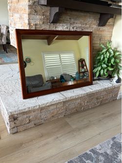 Framed  cherry wood accent mirror