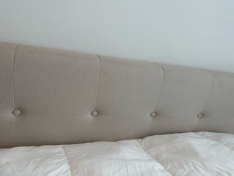 Tufted beige fabric full size bed frame