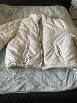 White puffer jacket & Marvel Venom jacket