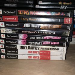 Assorted Ps2 Games With Box’s  Ready To Play 