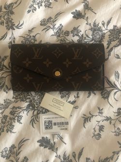 Authentic Louis Vuitton Sarah Wallet in Monogram Fushia
