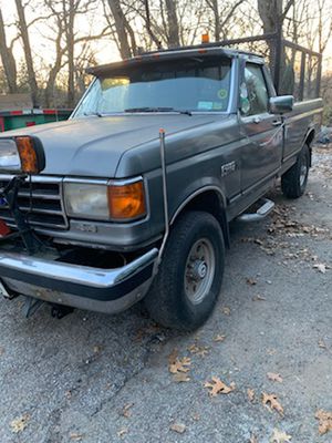 Photo 1989 FordF250 pickup with electric dump and new plow