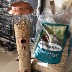 Bird Feeder And Bag Of Food 