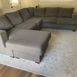 Gray Sectional Couch And Rug