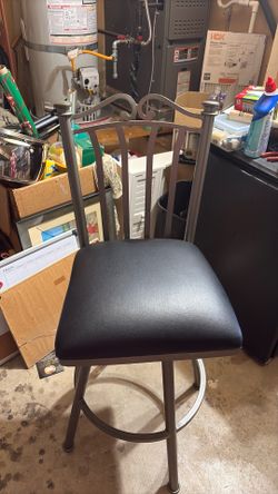 Set of two swivel bar stools seat is 30” tall