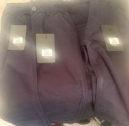 Boys size 6 & 7 pants blue only 8 pair , 2 pair of girl pants size blue only,1 girls dress ,2 boys grey pants