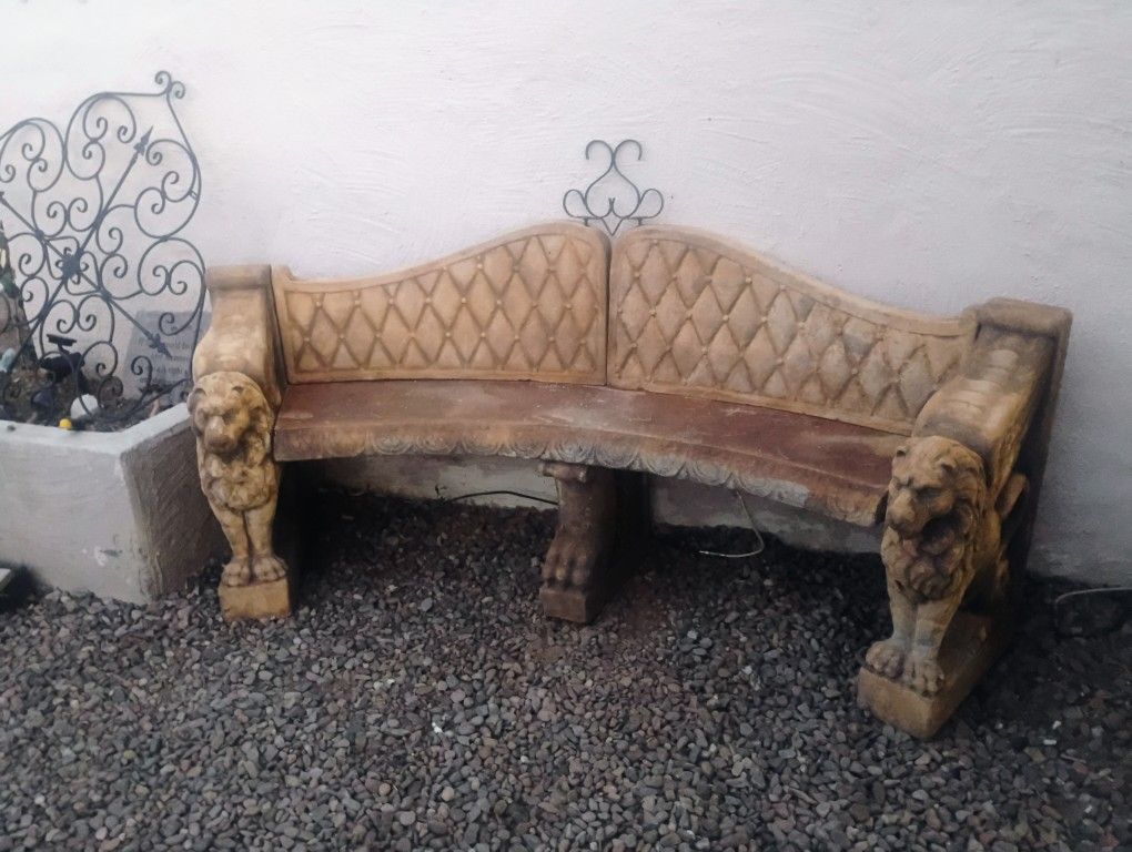curved concrete lion pillars bench
