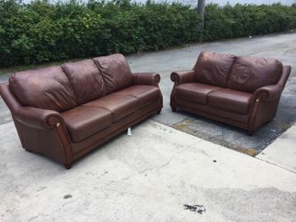 2 brown leather couches