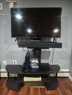 T.v with Playstation 4 and games