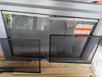 Goes on the front of a fireplace got two screens and some kind of frame that goes around the outside of it