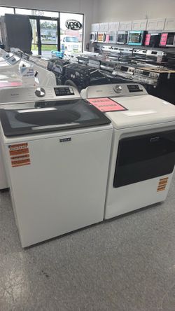 New scratch and dent Maytag washer and dryer set. 1 year manufacturing warranty