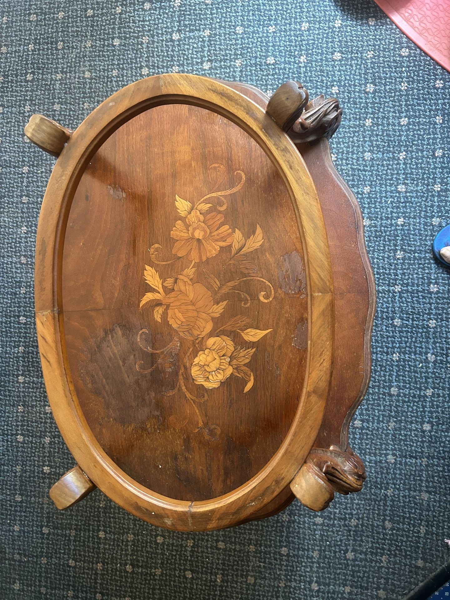Antique wooden table with serving tray