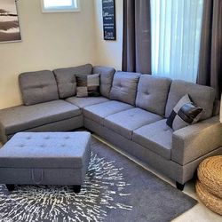 Gray linen sectional couch and ottoman