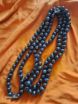 50" long South Sea black freshwater pearls