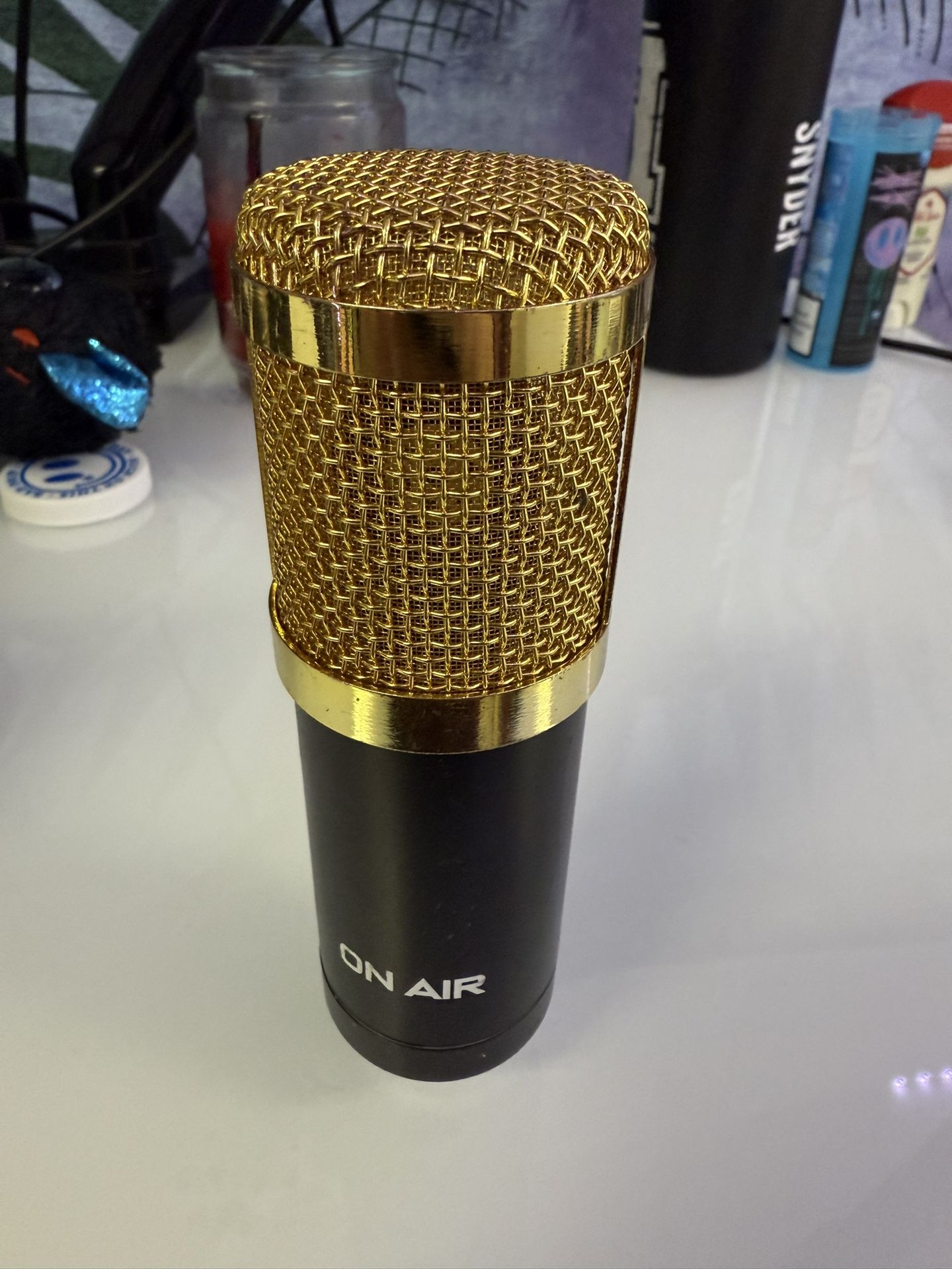 Gold on air microphone