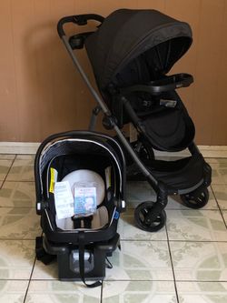 PRACTICALLY NEW GRACO MODES NEST TRAVEL SYSTEM STROLLER CAR SEAT AND BASSINET 3 IN 1