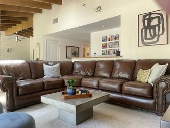 Brown leather sectional sofa