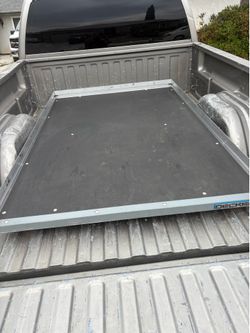 Decked truck bed slide tray system