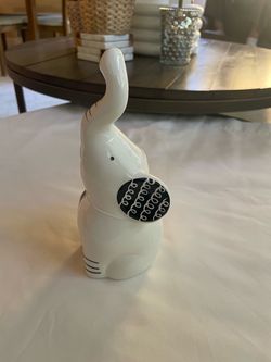 Ceramic Elephant Figurine with Swirl Pattern Ears and Trunk Accent Lines