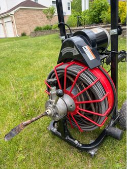 Auto feed drain cleaner