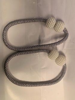 Holders for drapes