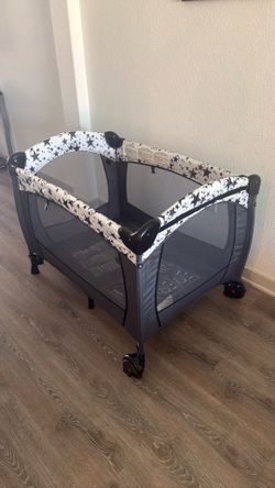 Evenflo portable crib / play area