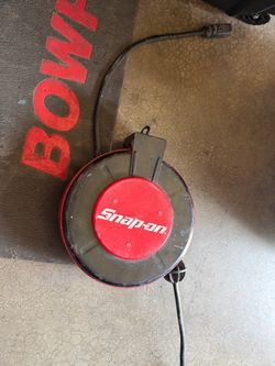 Retractable snap on extension cord