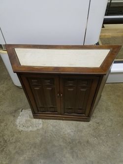 Antique hallway cabinet with granite/ marble top