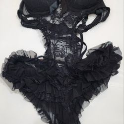 Cute Frilly Black Outfit With Crossing Straps In Back 