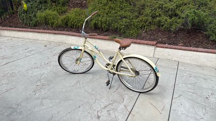 West Coast Limited Cream Beach Cruiser Bicycle with Floral Accents