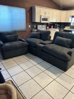 3 recliners with console