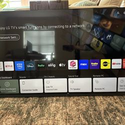 LG 55” Ultra HD 4K TV - w/ 15° Tilt Wall Mount 