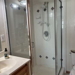 Glass shower enclosure