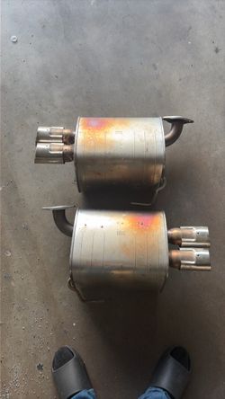 Factory stock OEM rear mufflers