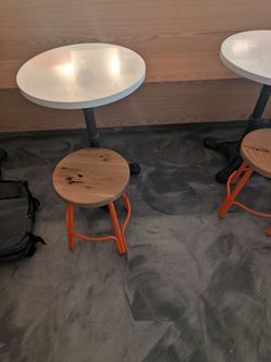 Round Wood Seat Stool with Orange Metal Base and metal tables set of 3