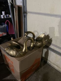 Brass antique ducks