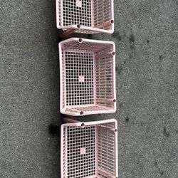 3 pink stackable baskets