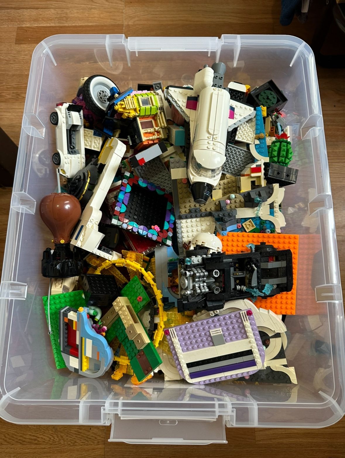 Huge bin of legos of Star wars, Ninjago, city, and much more