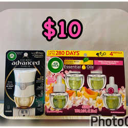 (1) Airwick Essential Oils (4 Refills) &( 1 )Airwick scented oil warmer