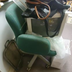 Pair  green cloth office chairs

