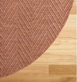 Terracotta colored Round Rug/Herringbone pattern