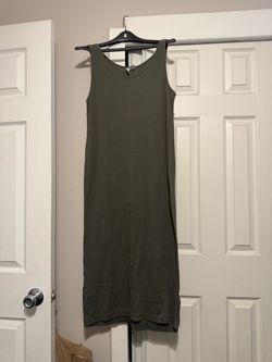 Olive color sleeveless dress length is above the ankles really nice condition