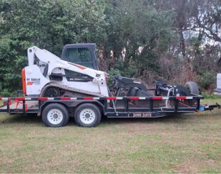Bobcat T750 Compact Track Loader + Trailer & Attachment