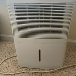Dehumidifier  Works Perfectly!