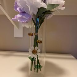 glass vase with fake flowers