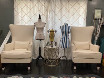 TWO WINGBACK CREAM FAUX LEATHER WOOD LEGS